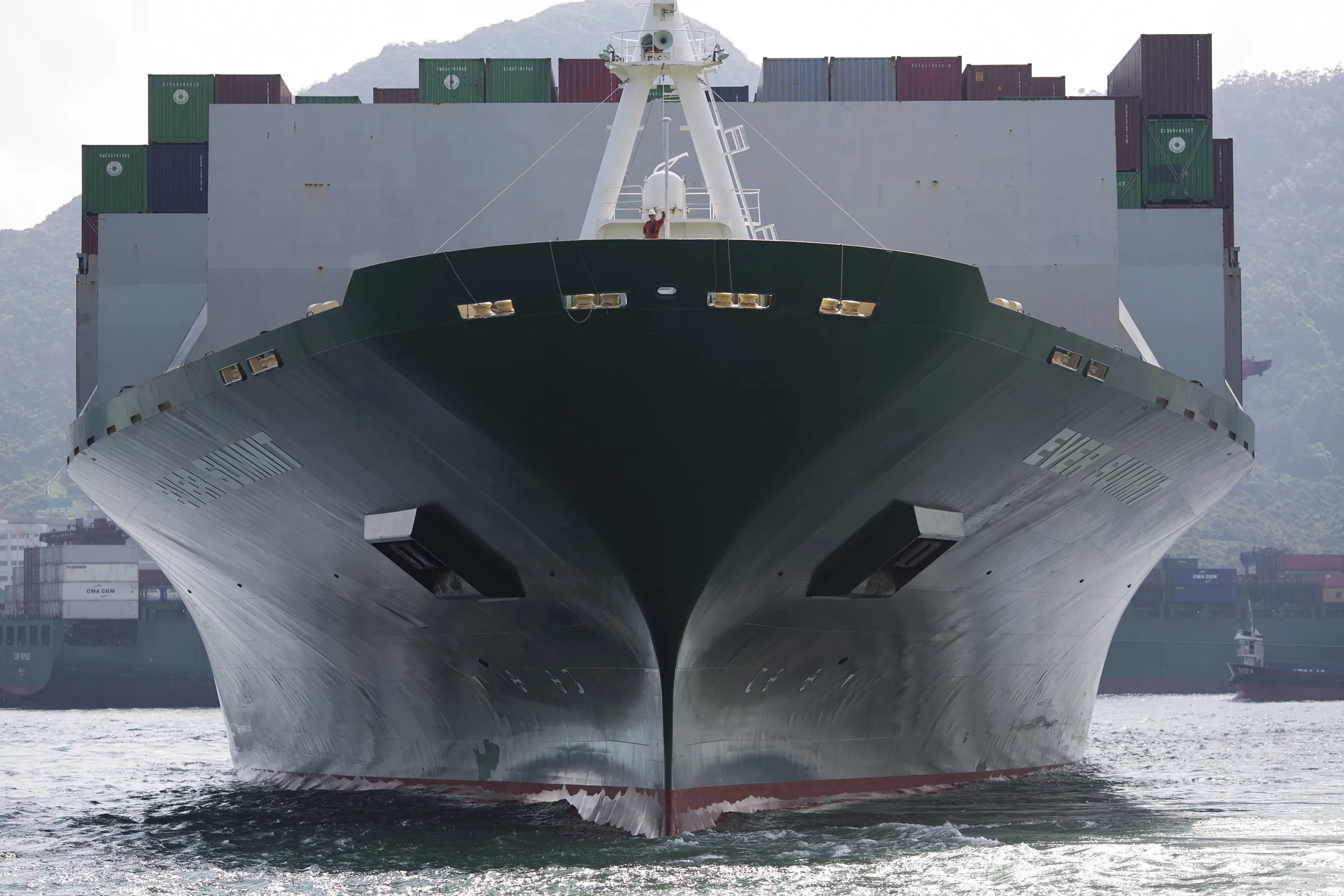 A man stands on the Evergreen Marine Corp. Taiwan Ltd. Ever Summit container ship.
