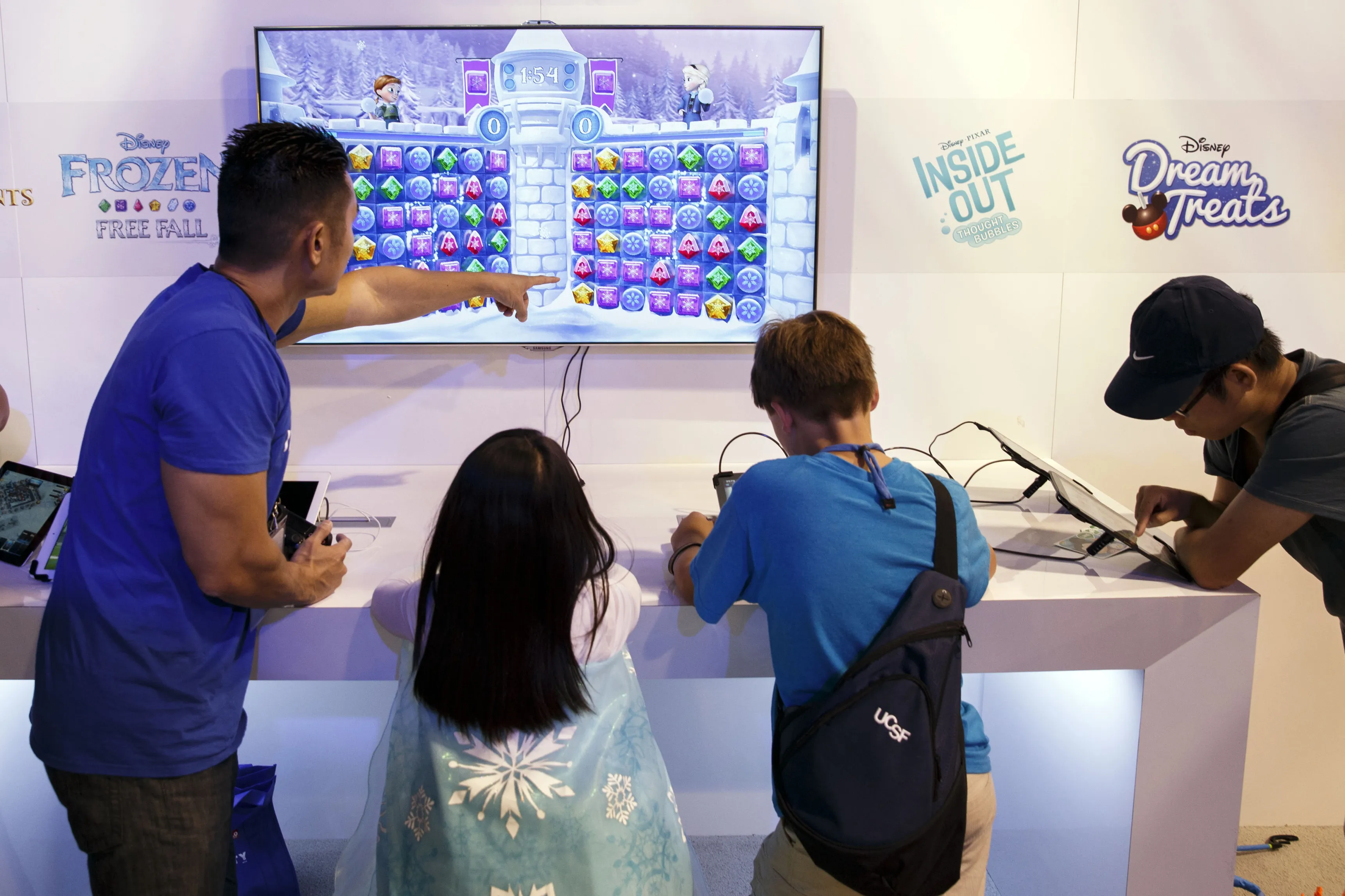 Children tries a Walt Disney Co.'s Frozen movie video game during the D23 Expo 2015 in Anaheim, California, on&nbsp;Aug. 14, 2015.&nbsp;