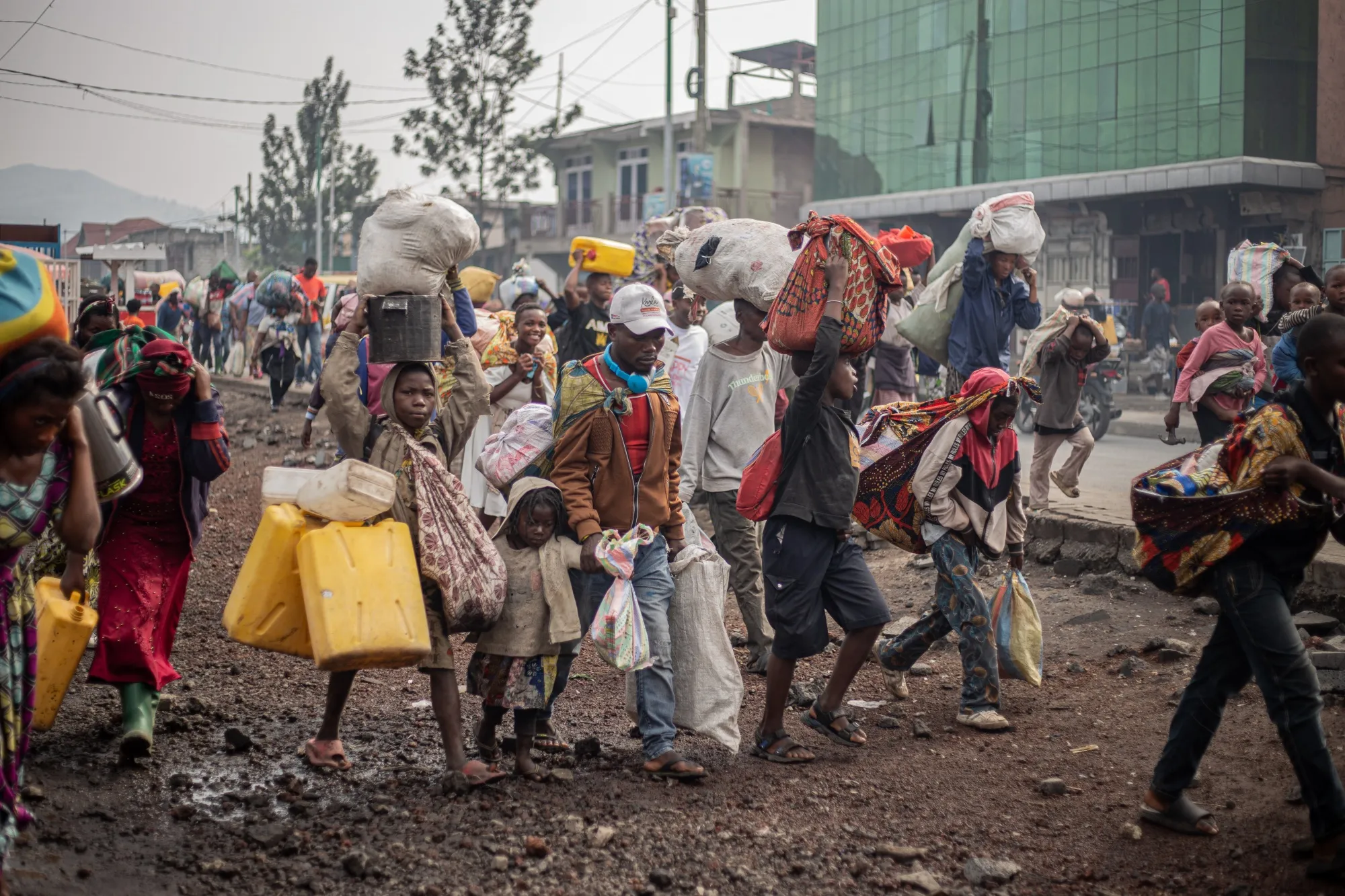 Residents flee from Kibati, a town near Goma in eastern Democratic Republic of Congo on Jan. 26.