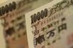 Yen Surge, Fed Gloom Threaten to Trap Japan Funds in Low Yields