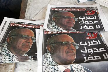 People In Yemen Follow Media Reports On Israeli Strikes That Killed Senior Houthi-run Government Officials