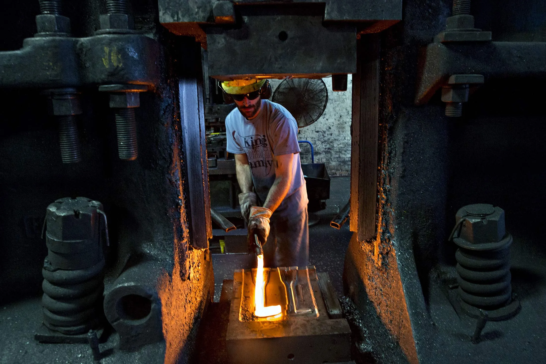 An employee shapes a Bear Claw Scraper Bar at a factory in Bushnell, Ill. on March 31.
