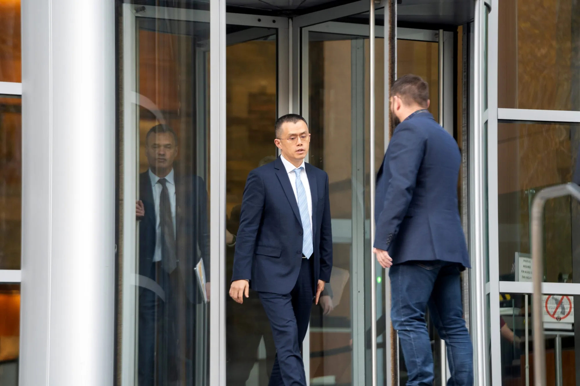 Changpeng Zhao exits federal court in Seattle, Washington, US, on Nov. 21, 2023.