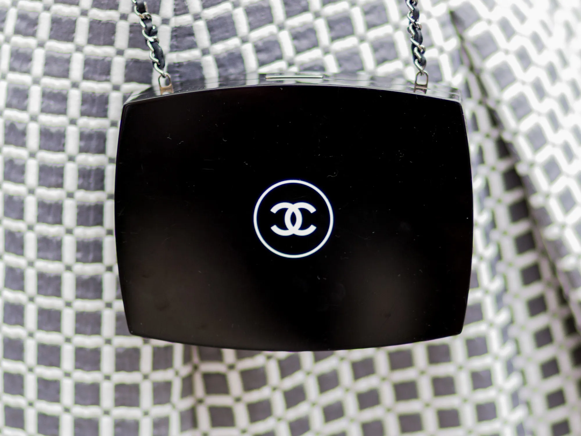 A bag carrying Chanel’s famous interlocking C’s logo.