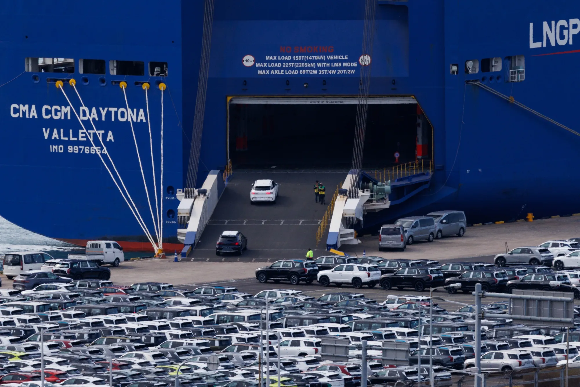 Hyundai Motor vehicles drive into a&nbsp;cargo ship&nbsp;near the company's Ulsan plant in March.