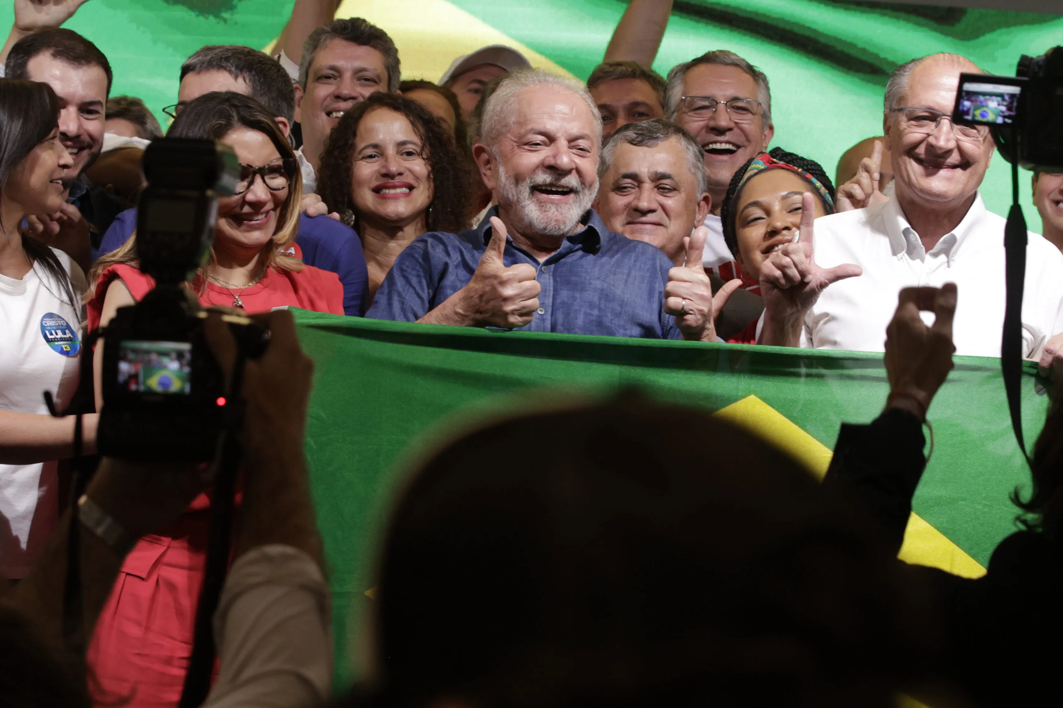 Luiz Inacio Lula da Silva, Brazil's president-elect, center, poses for a photograph after winning the runoff presidential election in Sao Paulo, Brazil, on Sunday, Oct. 30, 2022. Lula won election as Brazil’s president in a dramatic comeback for the left-wing politician who was languishing in a jail cell just three years ago on corruption charges.
