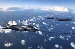 An F-35B combat aircraft from the United States Marine Corp refuels from an RAF Voyager aircraft over the North Sea.