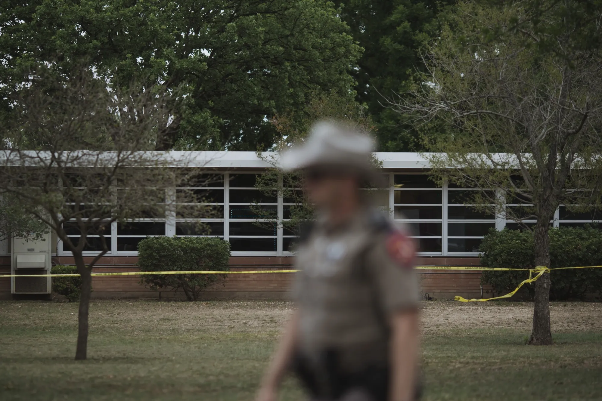 A Texas state trooper outside Robb Elementary School in Uvalde, Texas, on May 24.