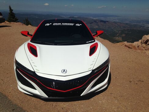 The 2016 Acura NSX is a hybrid that runs on a 6-cylinder engine paired with three electric motors.