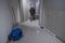 Jerry Dodson, a resident of the Millennium Tower, walks over leaking water in the basement area of the Millennium Tower in San Francisco, California, U.S., on Wednesday, Jan. 25, 2017. Photographer: David Paul Morris/Bloomberg