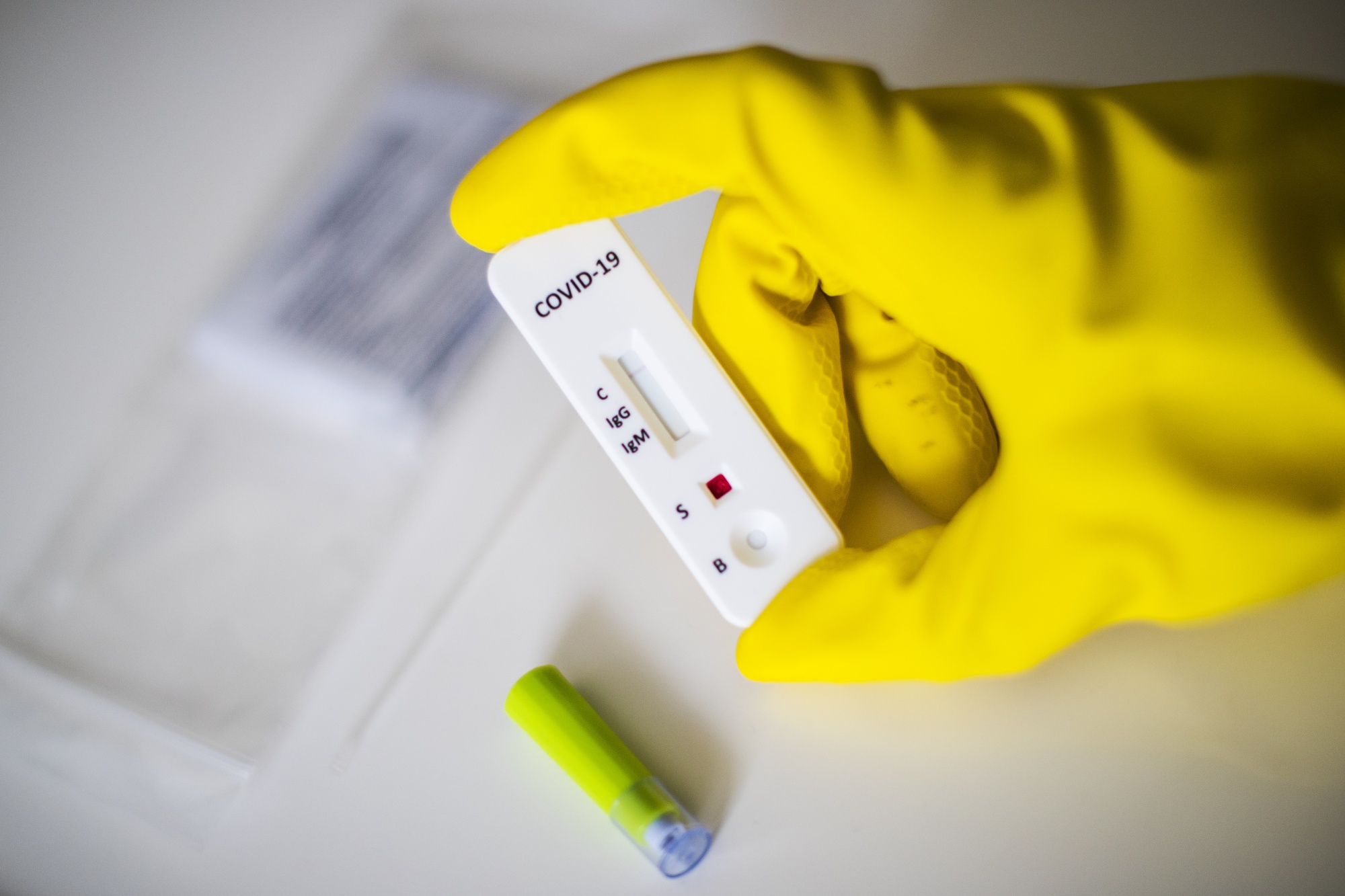 An at-home Premier Biotech Inc. Covid-19 antibody rapid test cassette.