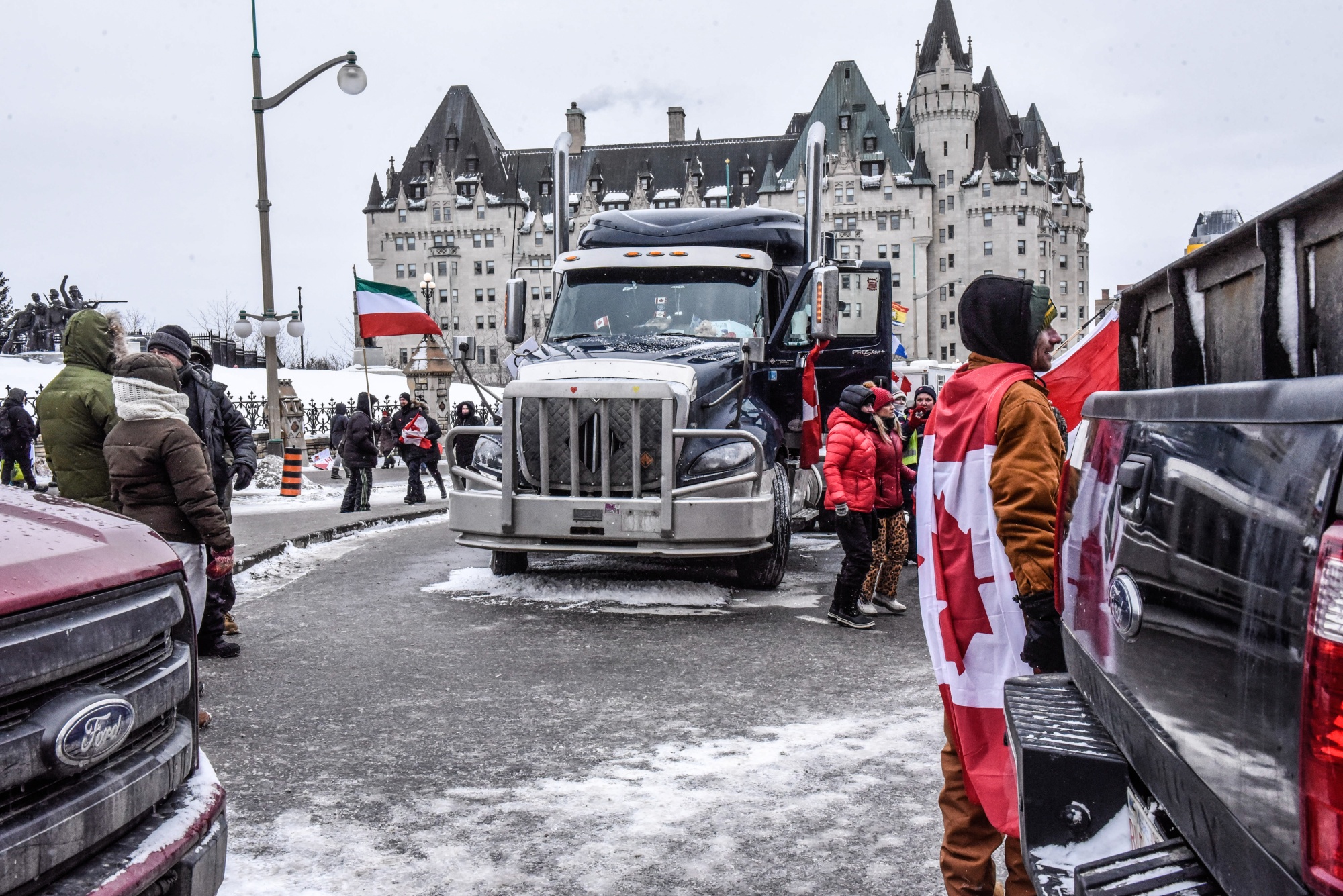 Protesters denounce Covid restrictions near the parliament buildings in Ontario on Feb. 12.