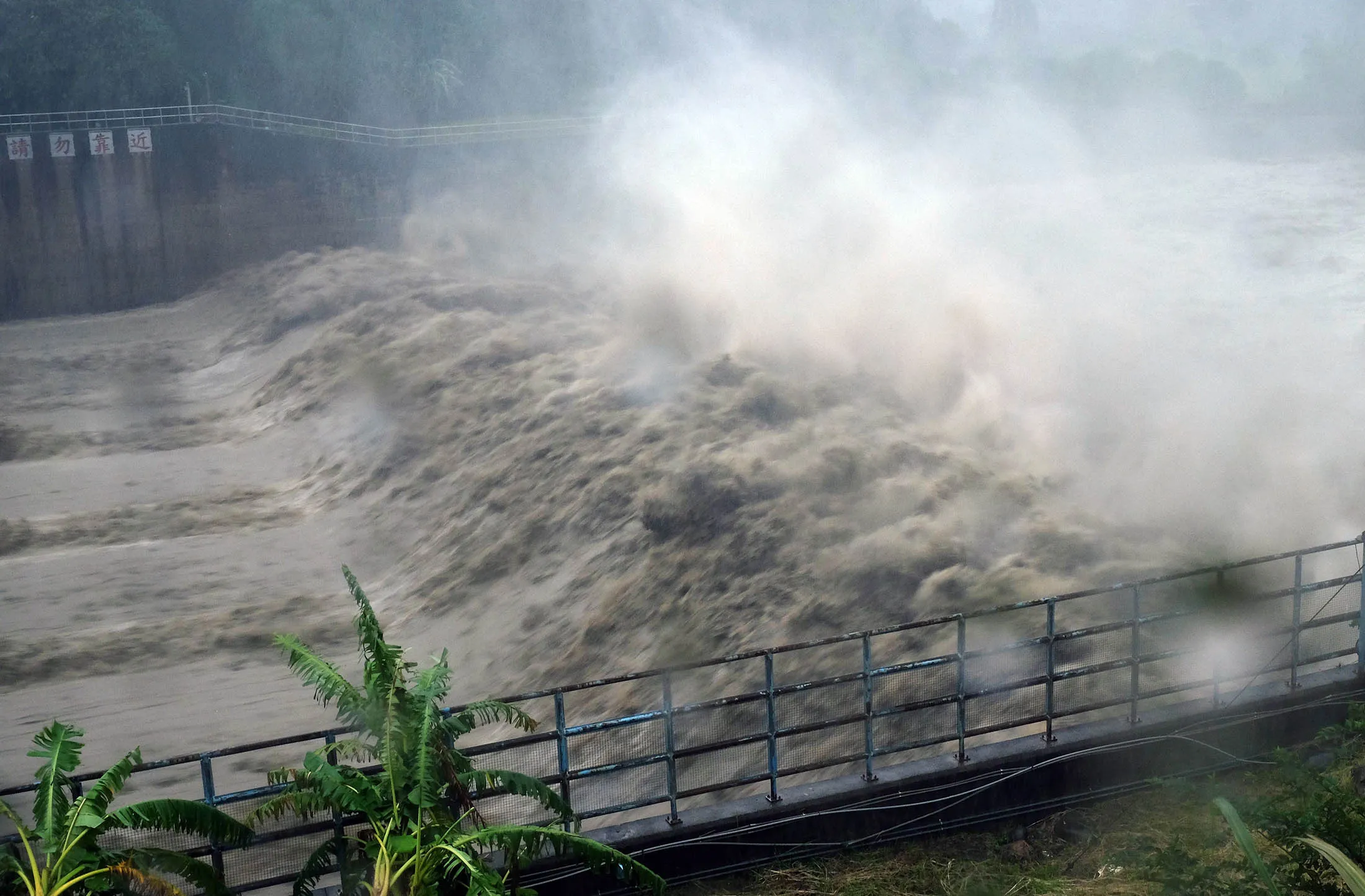 Churning waters in the Jhihtan Dam in Taiwan on Sept. 27.
