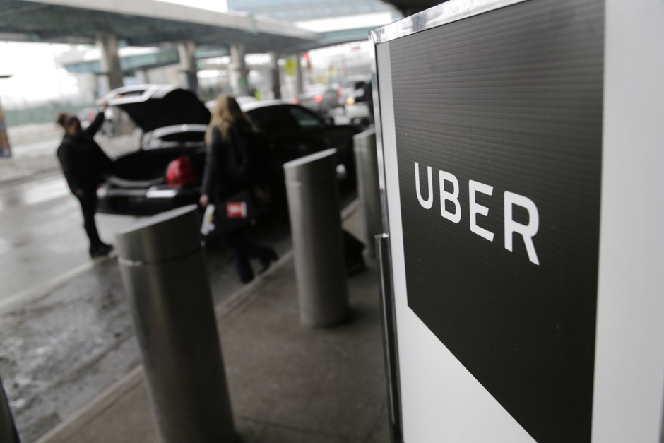 Drivers in Boston are protesting new legislation and deeper background checks that have disqualified them from working for services including Uber. 