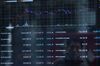 A monitor shows the prices of virtual currencies.