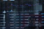 A monitor shows the prices of virtual currencies.