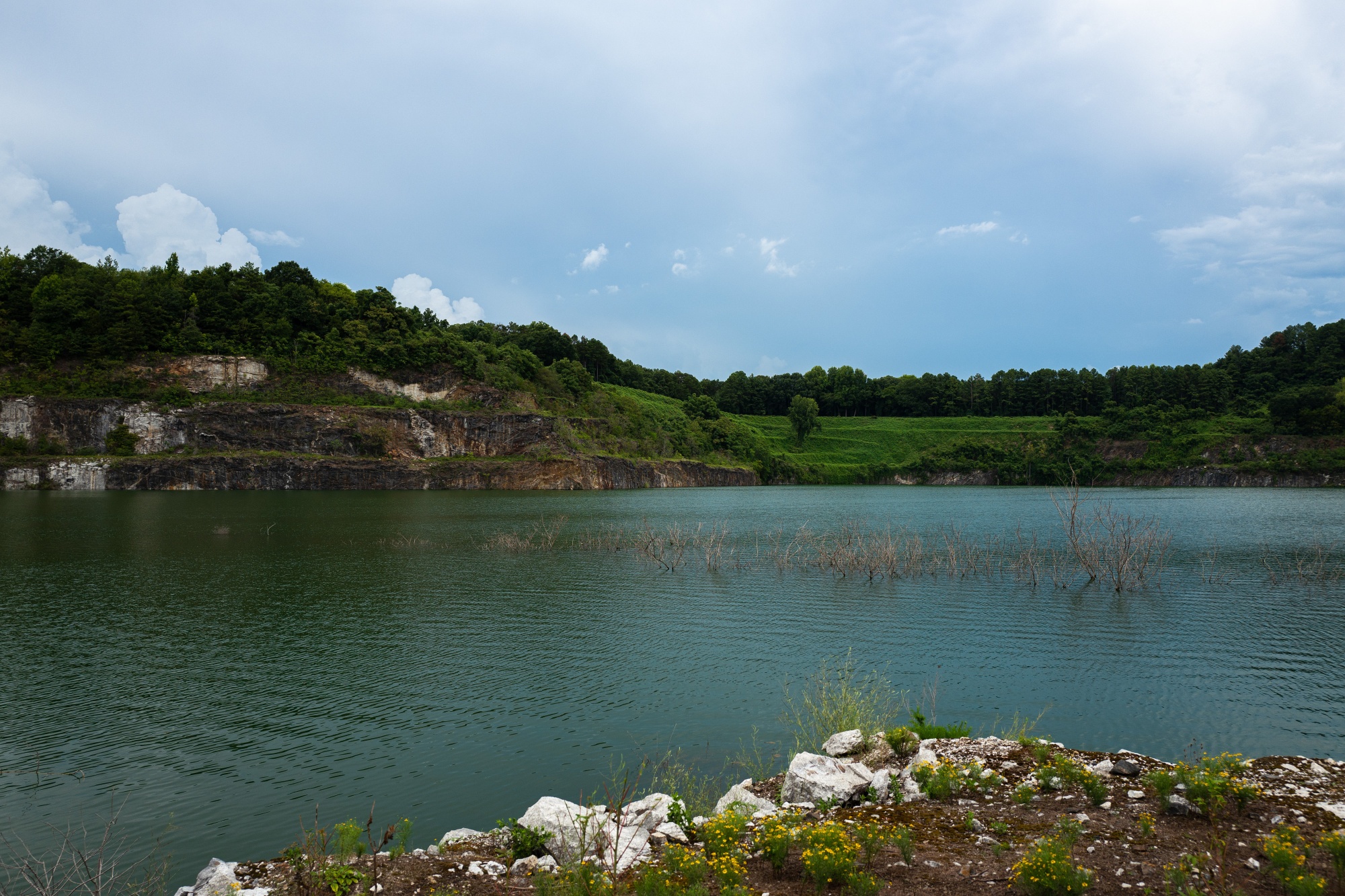 A pond in a&nbsp;shuttered lithium quarry&nbsp;in Kings Mountain, North Carolina. Albemarle’s proposal to restart operations is part of automakers’ plan to reduce their&nbsp;dependence on China for EV batteries.&nbsp;