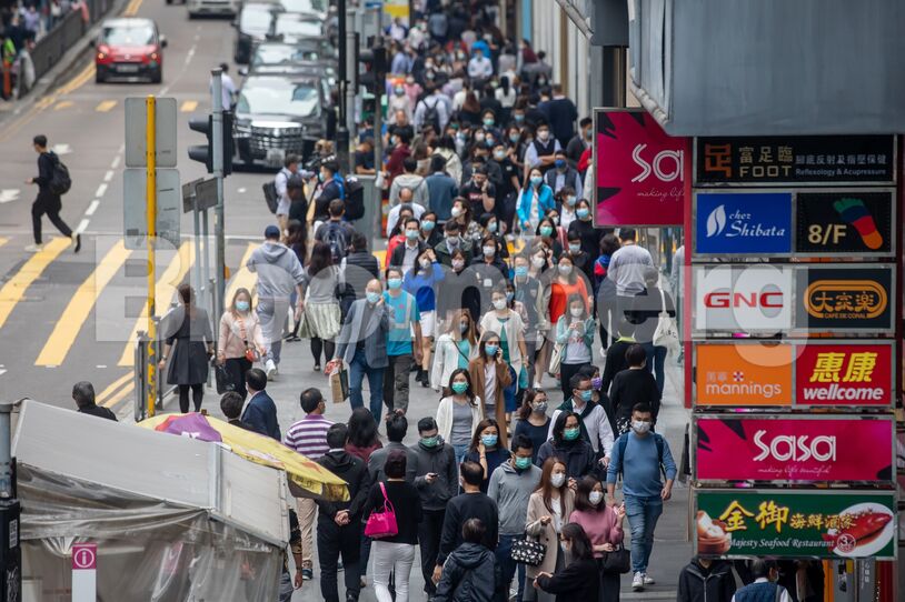 Officers Workers In Hong Kong's Central Business District As Stocks Priced Near All-Time Low