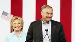 Tim Kaine, presumptive 2016 Democratic vice-presidential nominee, smiles on stage with Hillary Clinton during a campaign event in Miami on July 23, 2016.
