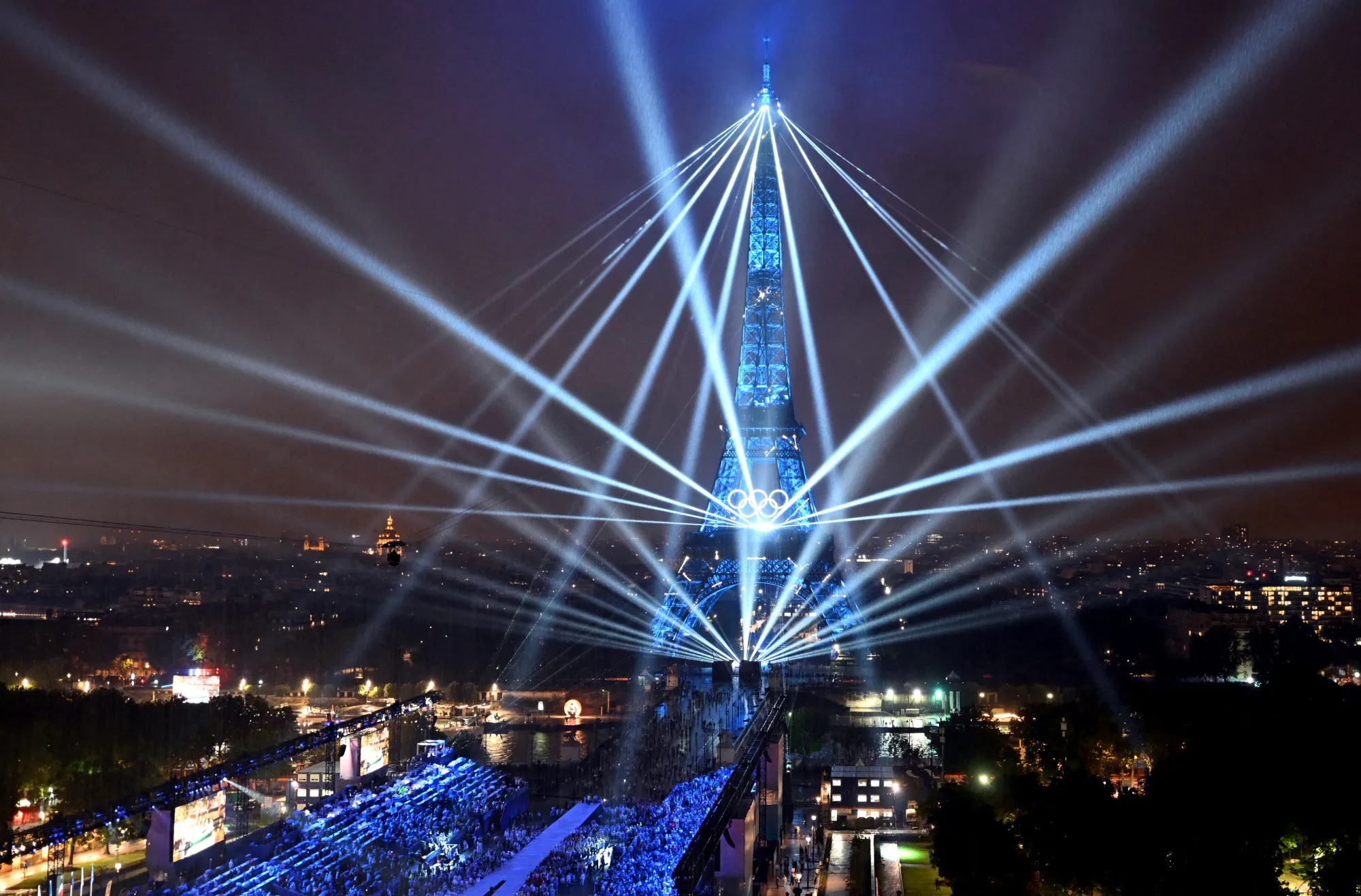 The Eiffel Tower and lasers lighting up the sky, during the opening ceremony of the Paris 2024 Olympic Games in Paris on July 26.