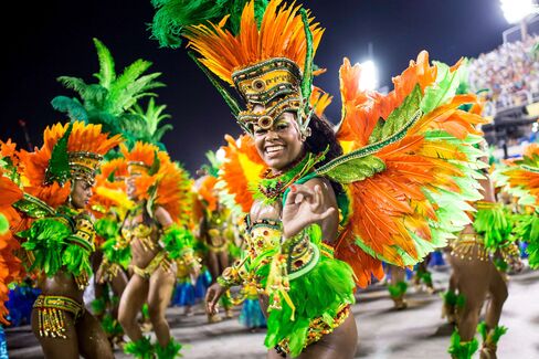 Members of Vila Isabel samba school perform during its parade at Brazilian Carnival.