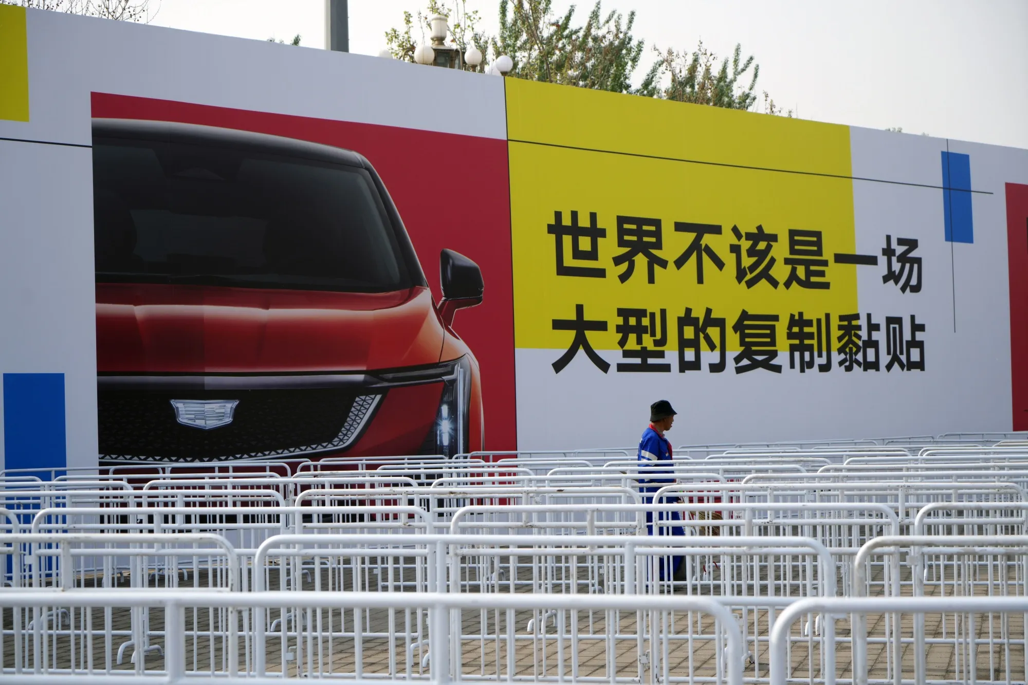 An advertisement for the Cadillac Escalade IQ electric sport utility vehicle outside the Beijing Auto Show in April.