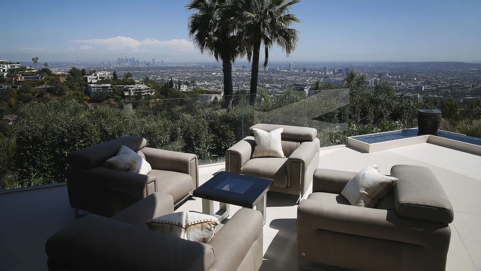 Downtown Los Angeles is seen from the balcony of a home in Beverly Hills.