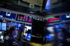 A trader works on the floor of the New York Stock Exchange (NYSE) in New York, U.S.