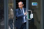Giovanni Lombardo, a former bond trader at Nomura Holdings Inc., leaves an employment tribunal in London, U.K., on Tuesday, May 17, 2016.
