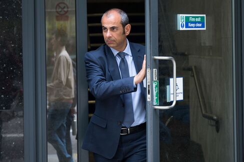 Giovanni Lombardo, a former Nomura Holdings Inc. bond salesman, leaves an employment tribunal in London on May 17.