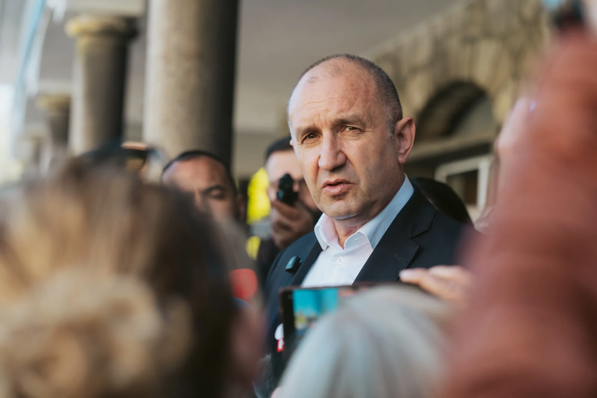 Radev speaks to reporters at a polling station in Sofia on Sunday.