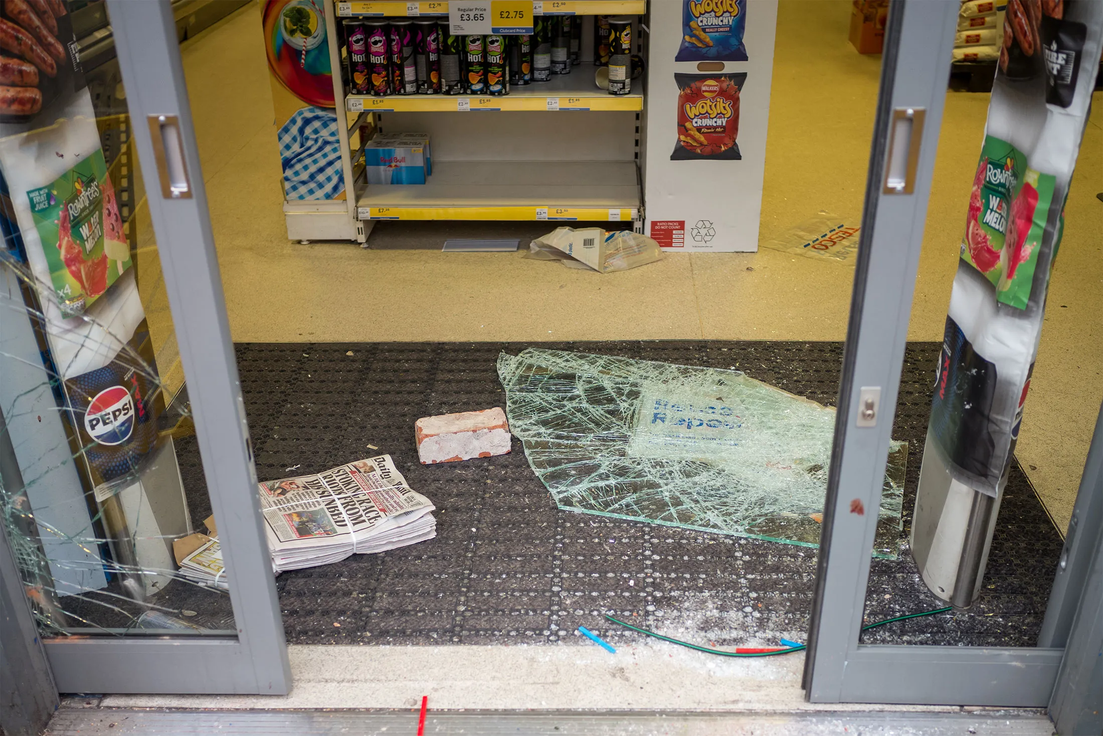 Damaged doors and windows at a shop following riots in Middlesbrough, England, on Aug.&nbsp;5.