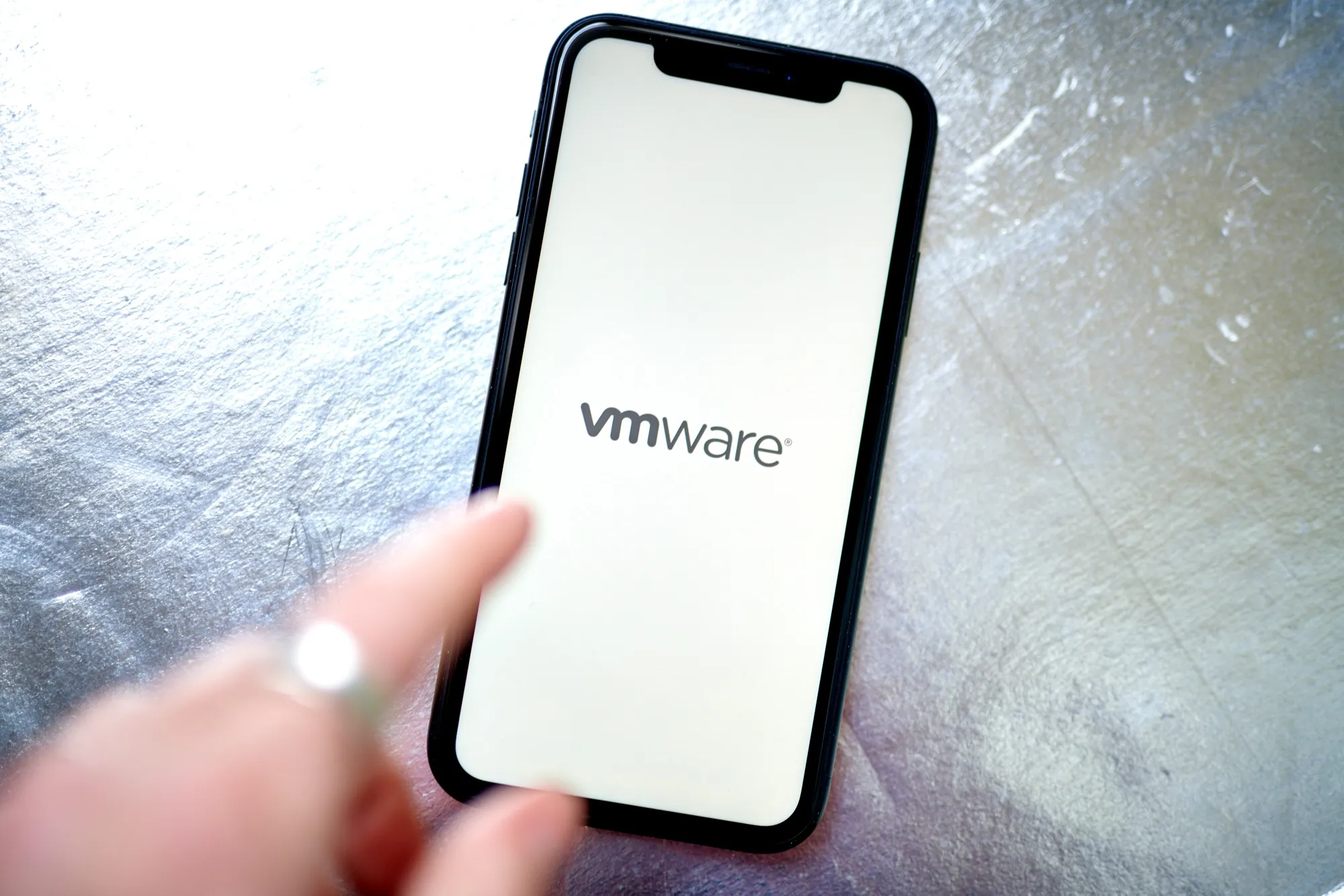 The VMware logo on a smartphone