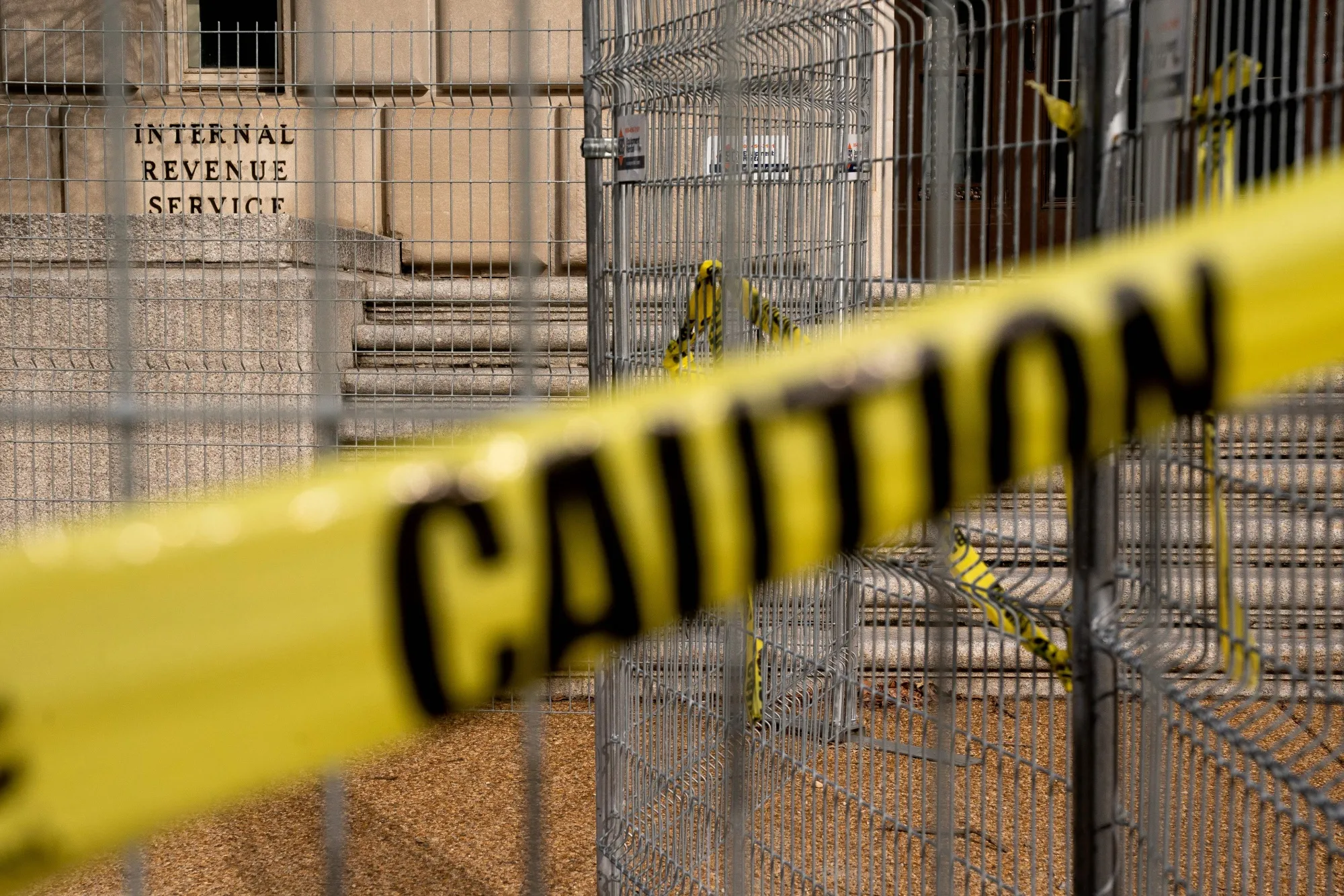 Fencing and Caution tape at the Internal Revenue Service building in Washington, DC.&nbsp;
