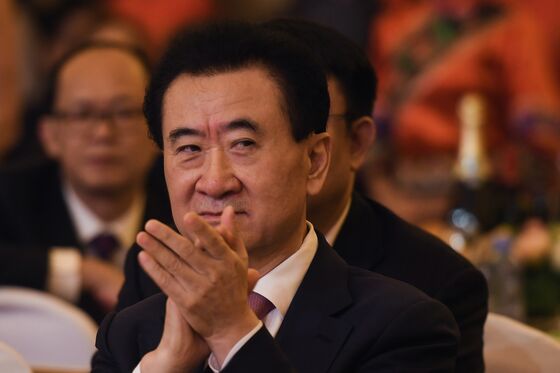 Reddit Traders Help Chinese Billionaire Exit AMC With Gain