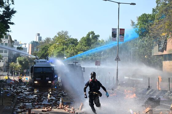 Water Cannon Fails to Move Holed-Up Protesters