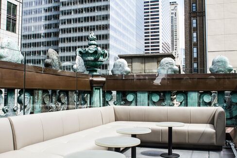 Inside St. Cloud's northwest Skypod. This private lounge seats 18 people and overlooks 42nd street and Broadway.