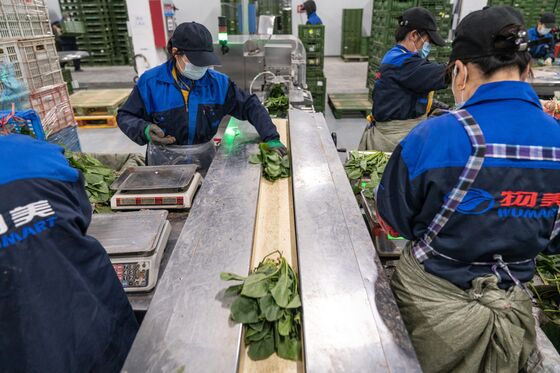 After Years in Prison, China Grocery Tycoon Weighs Twin IPOs