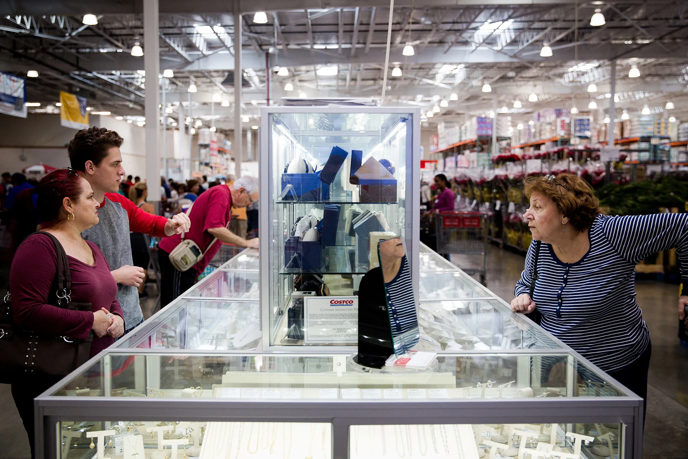 Customers browse in the jewelry department at a store in Miami, Florida, on Dec. 5, 2016.
