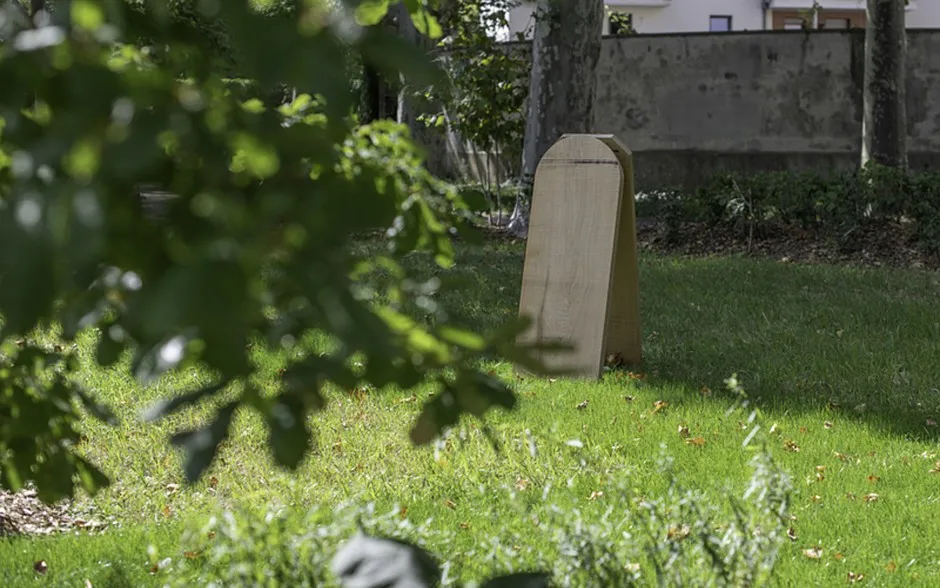 Wooden grave markers like this one will be inscribed with the names of the deceased, and replaced approximately every 10 years.