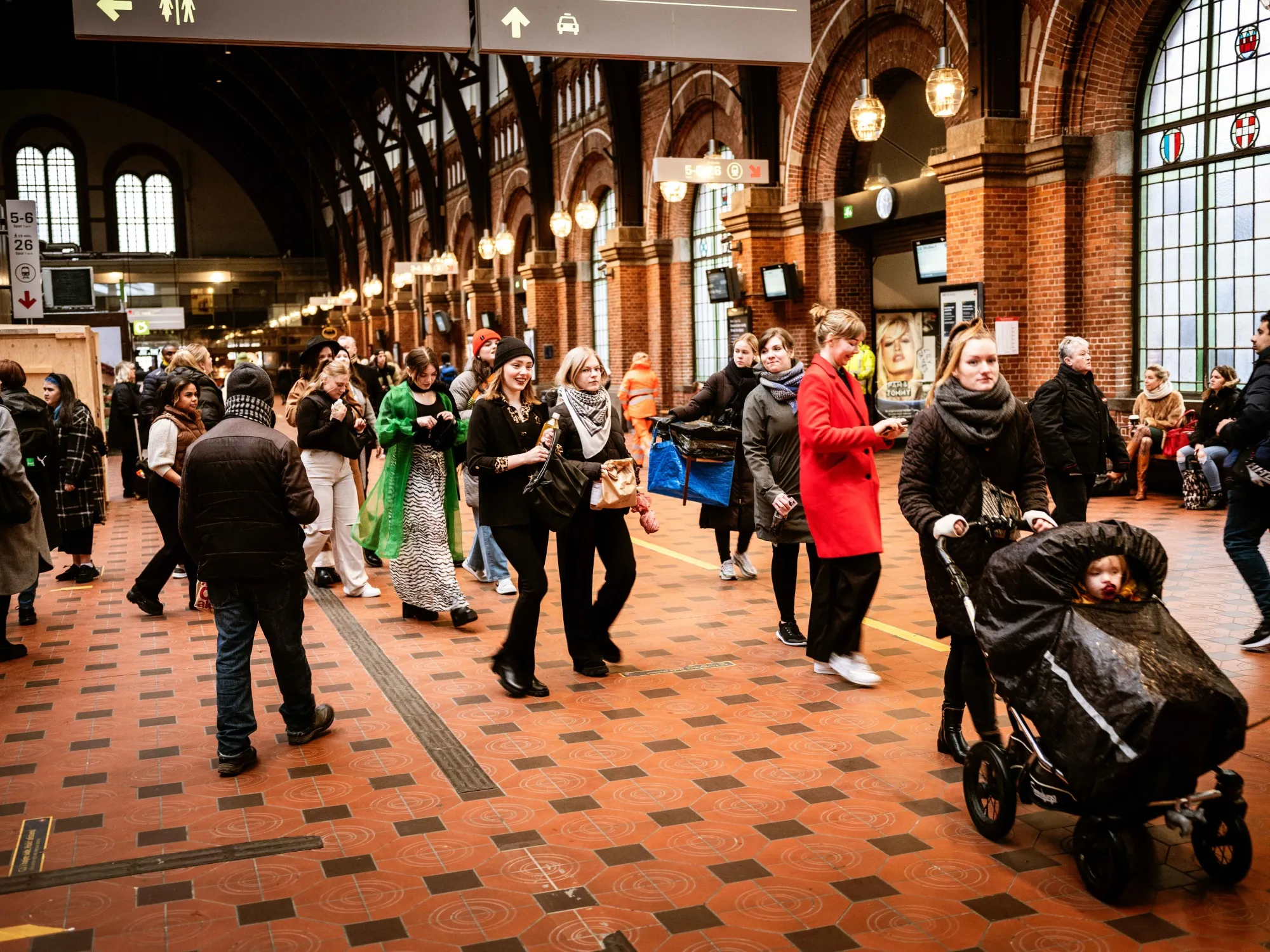 Commuters at Central railway station in Copenhagen, Denmark.