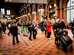 Commuters at Central railway station in Copenhagen, Denmark.
