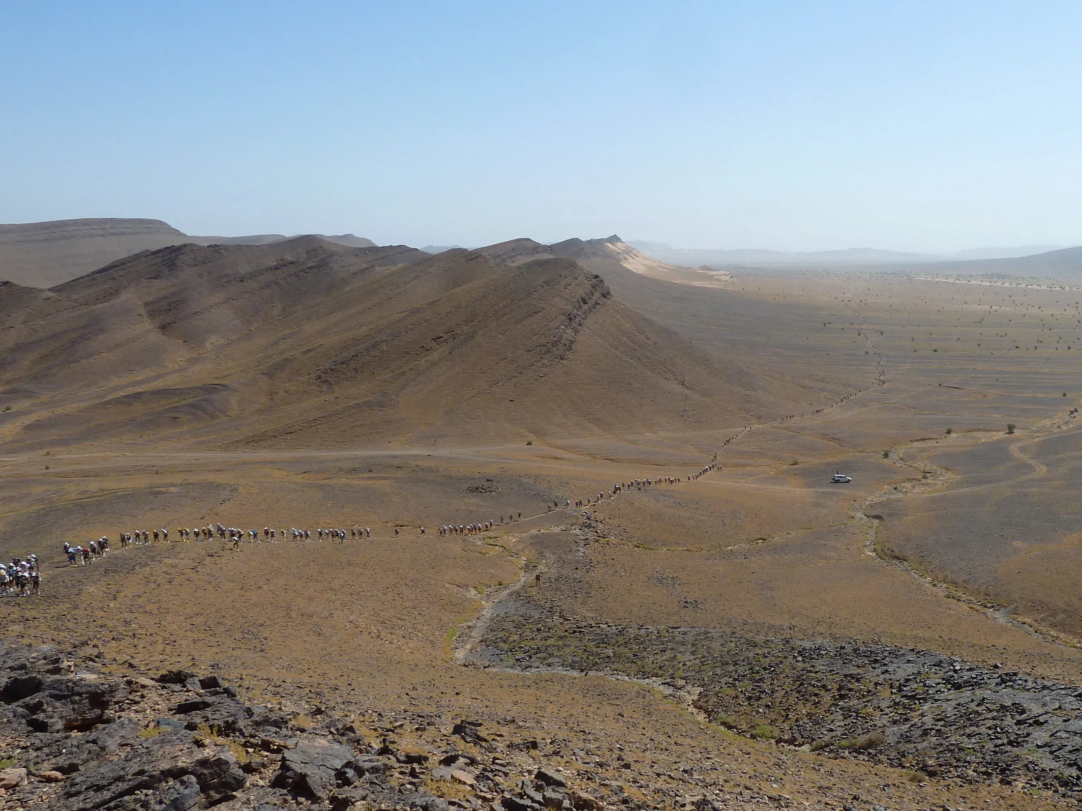 Competitors scale Hered Asfer Jebel, a hill in the Moroccan Sahara, on the second stage of the Marathon des Sables.
