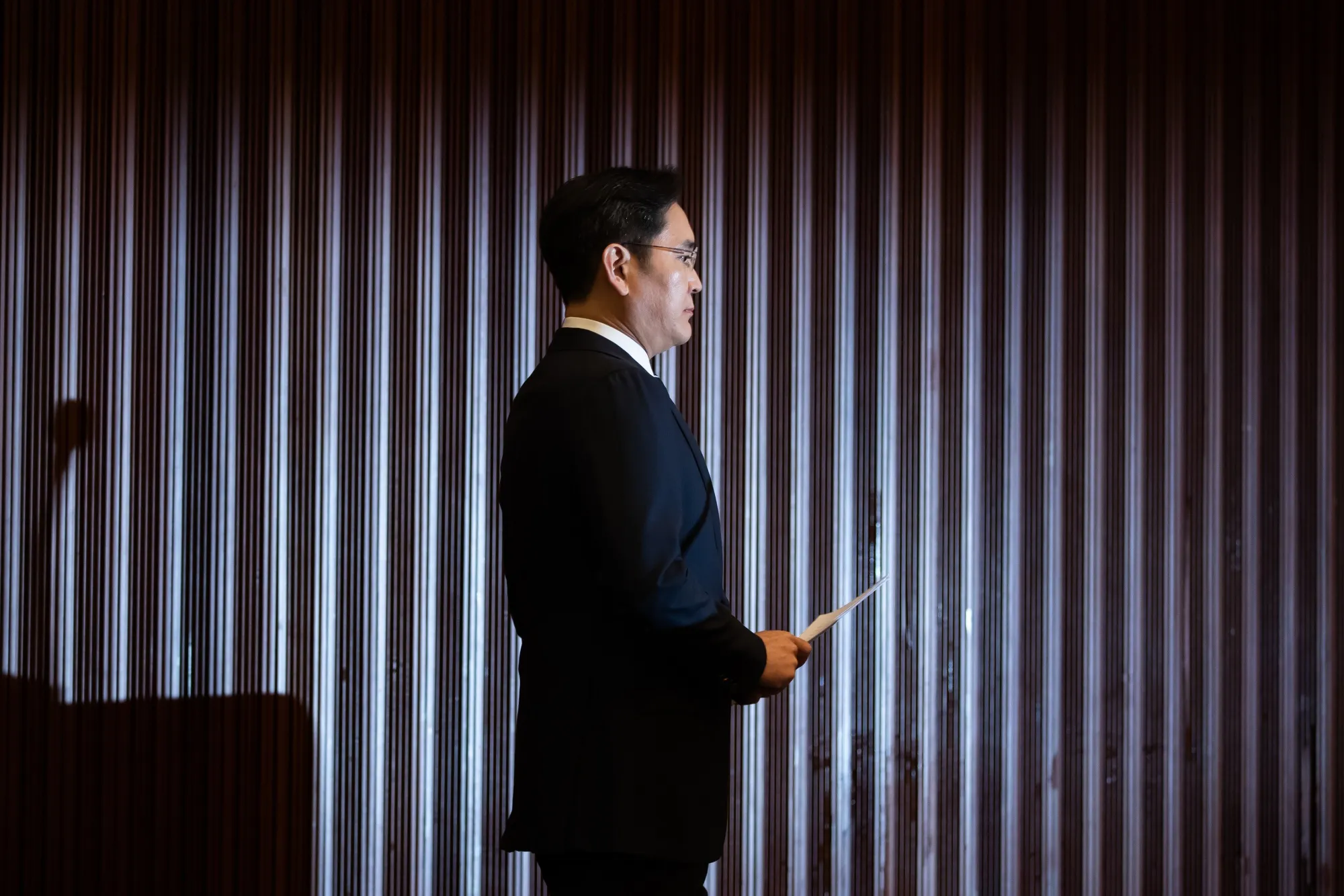 Jay Y. Lee arrives for a news conference in Seoul on May 6.