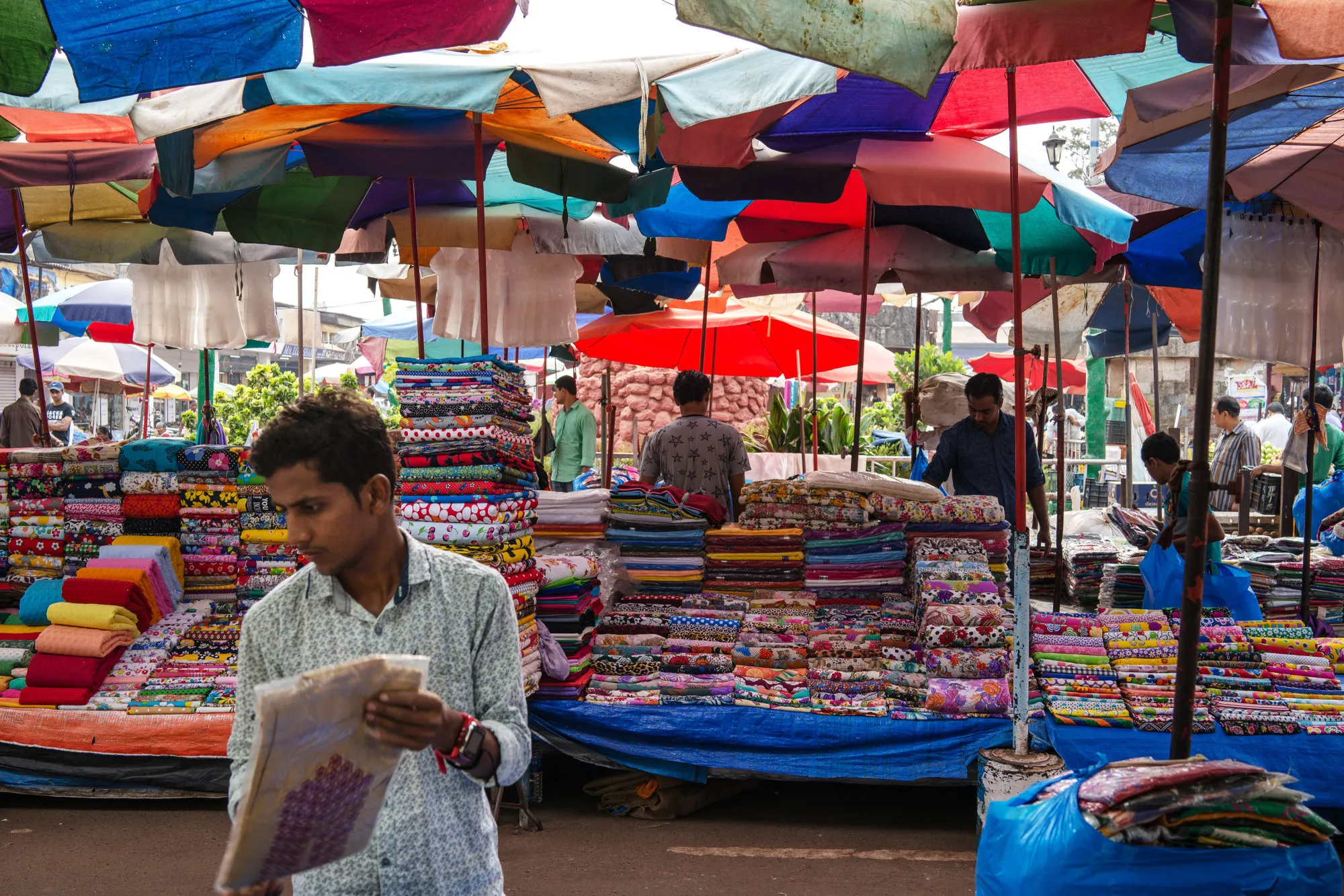 Beachgoers And Shoppers Ahead of Consumer Inflation Figures 