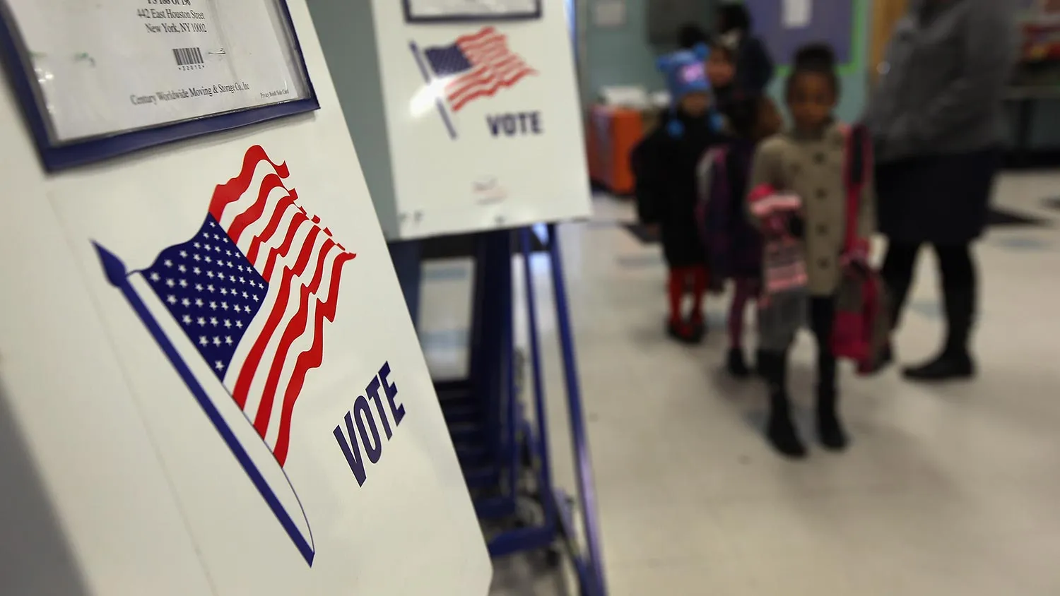 Voting booths stand at the ready as students return to school on November 5, 2012 in the East Village neighborhood of New York, United States.
