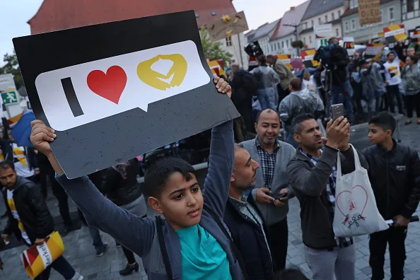 Gratitude for Merkel's generosity.
