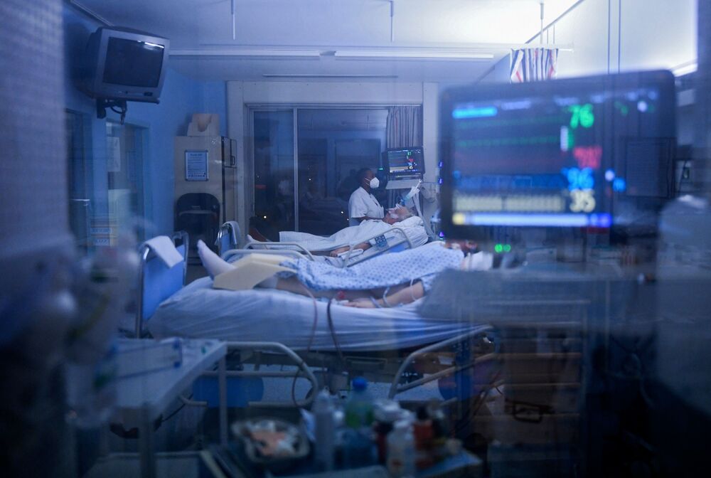 A medical staff tends to a Covid-19 patient at a Hospital in Belgium on Dec. 21.