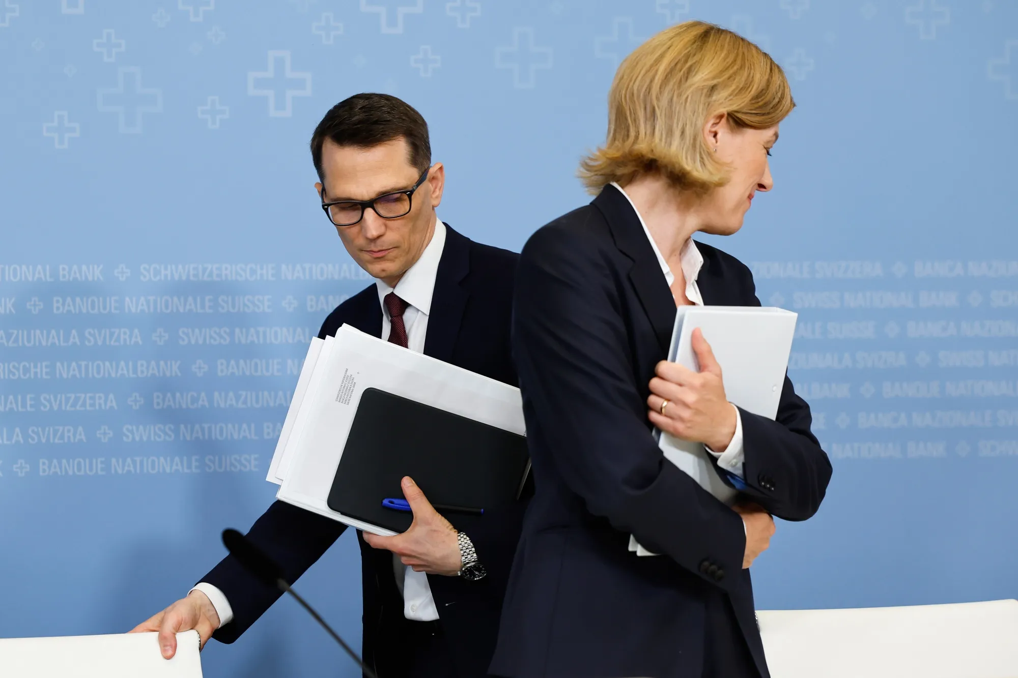 Martin Schlegel, left, and SNB Board Member Petra Tschudin, at a news conference in Zurich, on June 19.