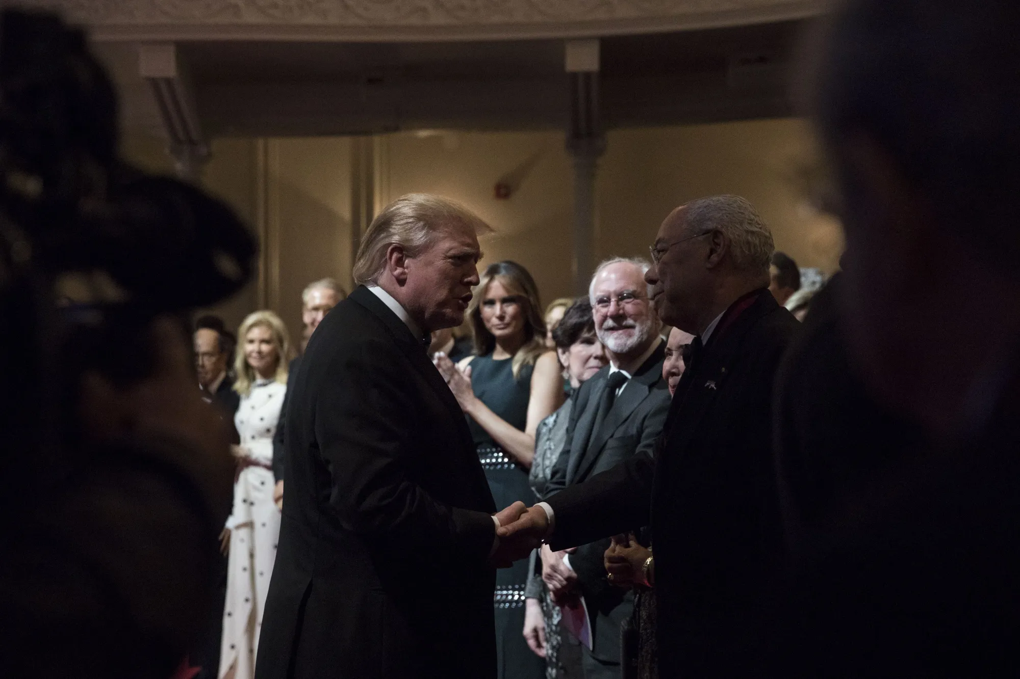 U.S. President Donald Trump&nbsp;shakes hands with Colin Powell in Washington, D.C., U.S., in 2019.&nbsp;